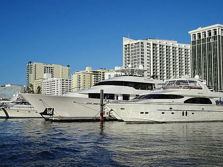 a couple of white yachts in a harbor aboard ENDLESS SUMMER Yacht for Sale
