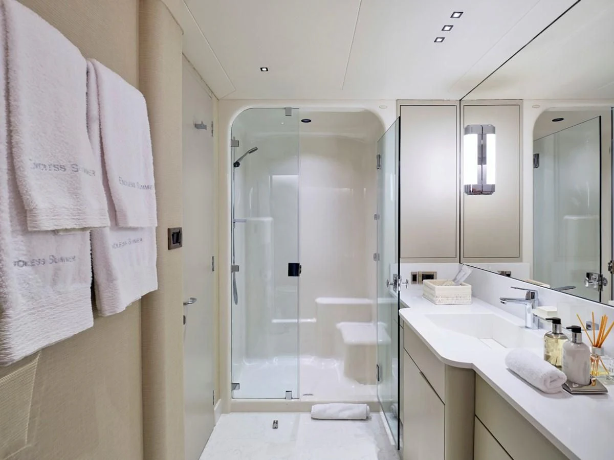 a bathroom with a shower and sink aboard ENDLESS SUMMER Yacht for Sale