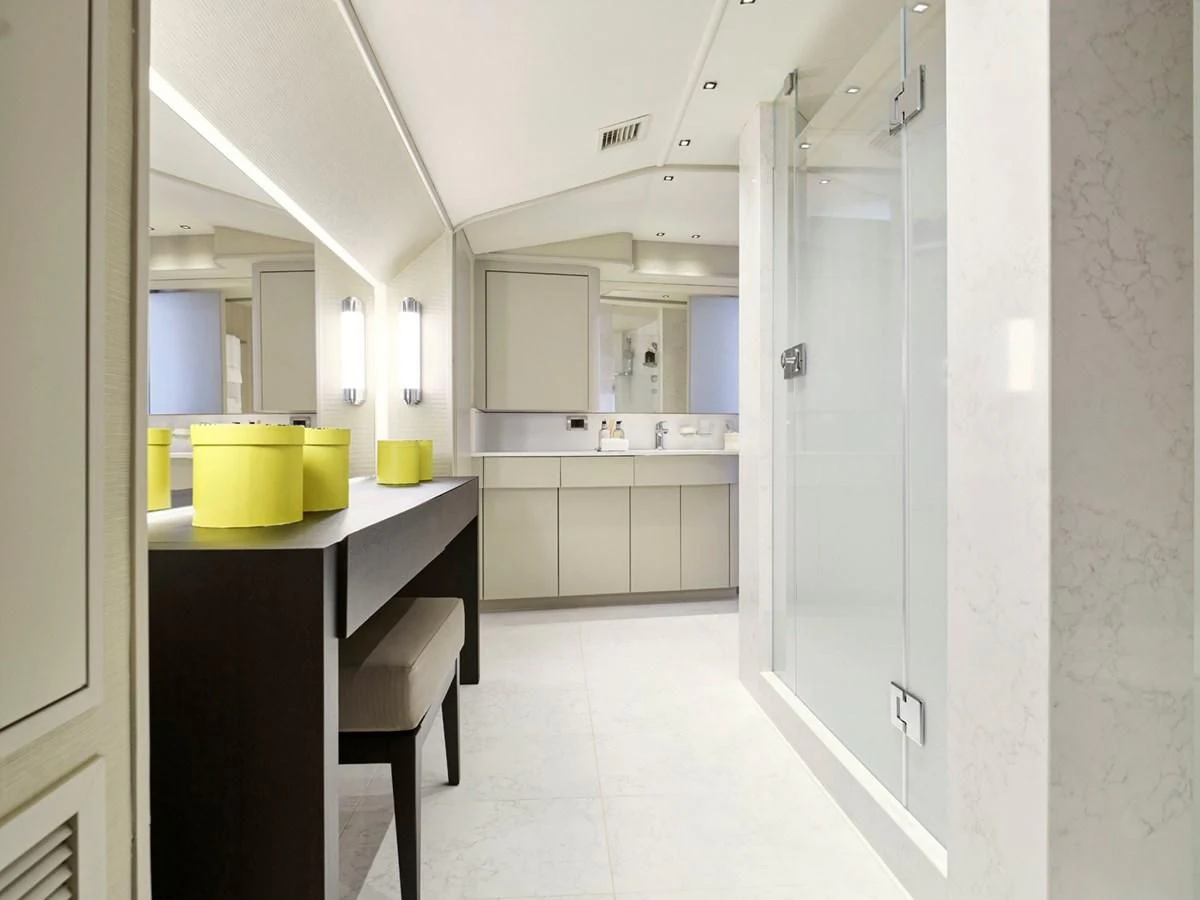 a kitchen with white cabinets aboard ENDLESS SUMMER Yacht for Sale