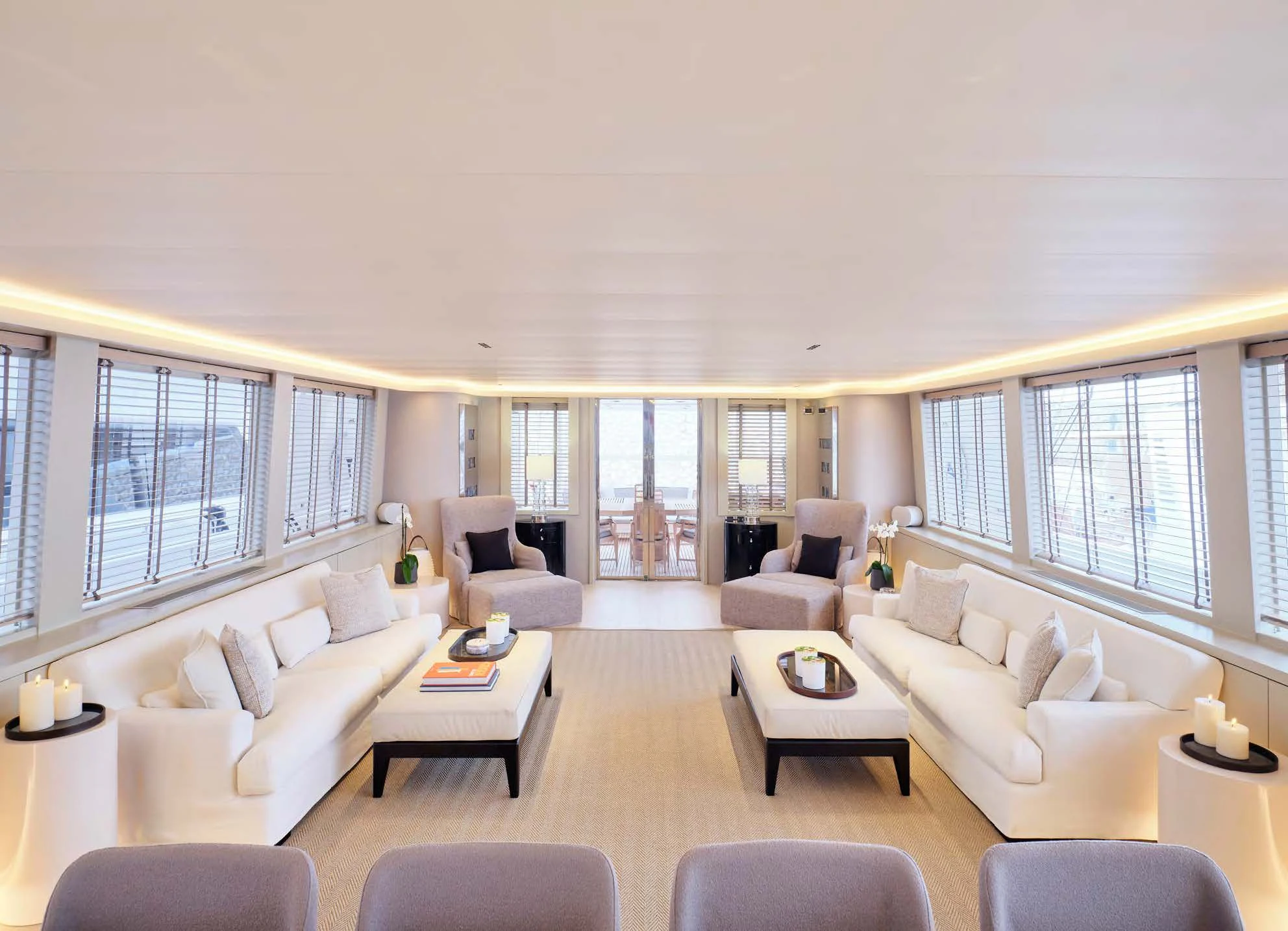 a living room with a large window aboard ENDLESS SUMMER Yacht for Sale