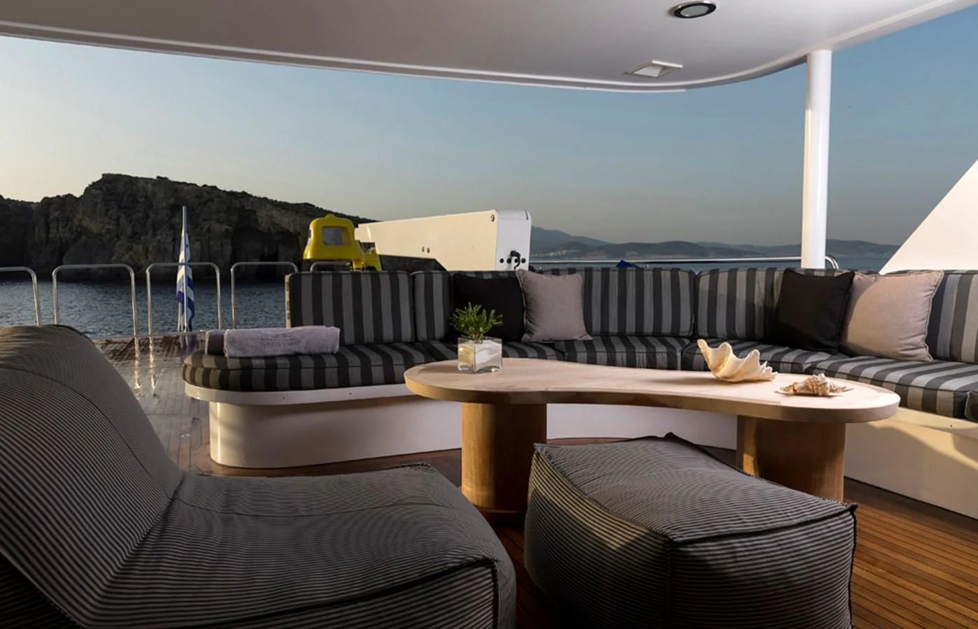 a living room with a couch and a table aboard ENDLESS SUMMER Yacht for Sale