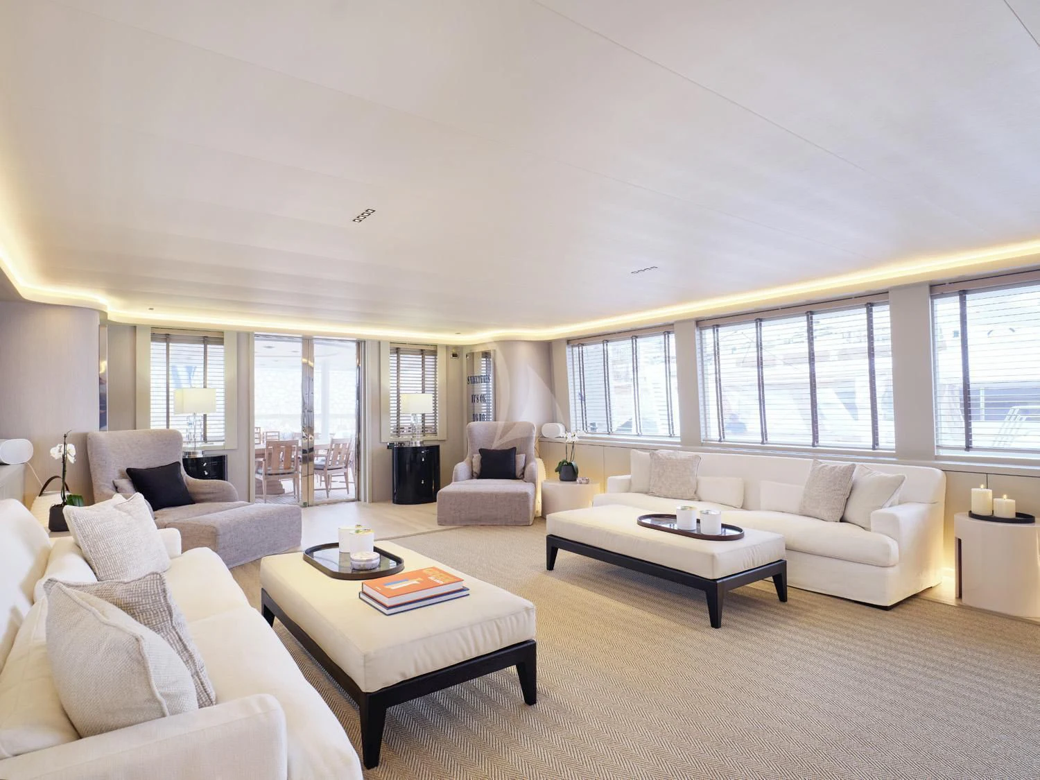 a living room with a large window aboard ENDLESS SUMMER Yacht for Sale