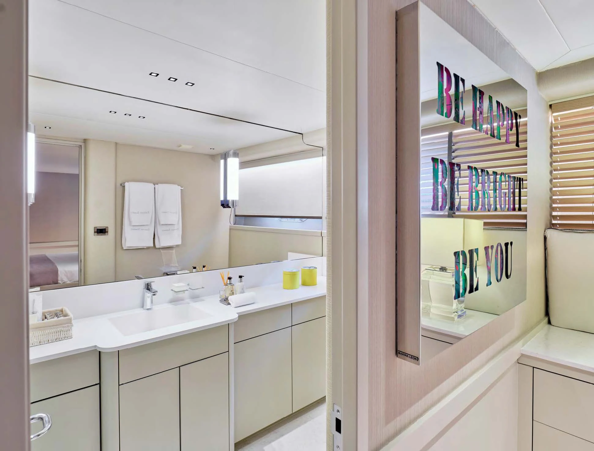 a bathroom with a large mirror aboard ENDLESS SUMMER Yacht for Sale