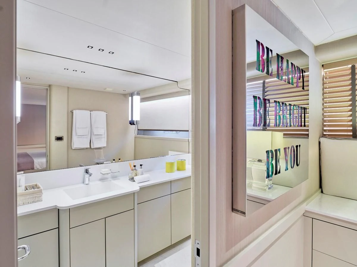 a bathroom with a large mirror aboard ENDLESS SUMMER Yacht for Sale