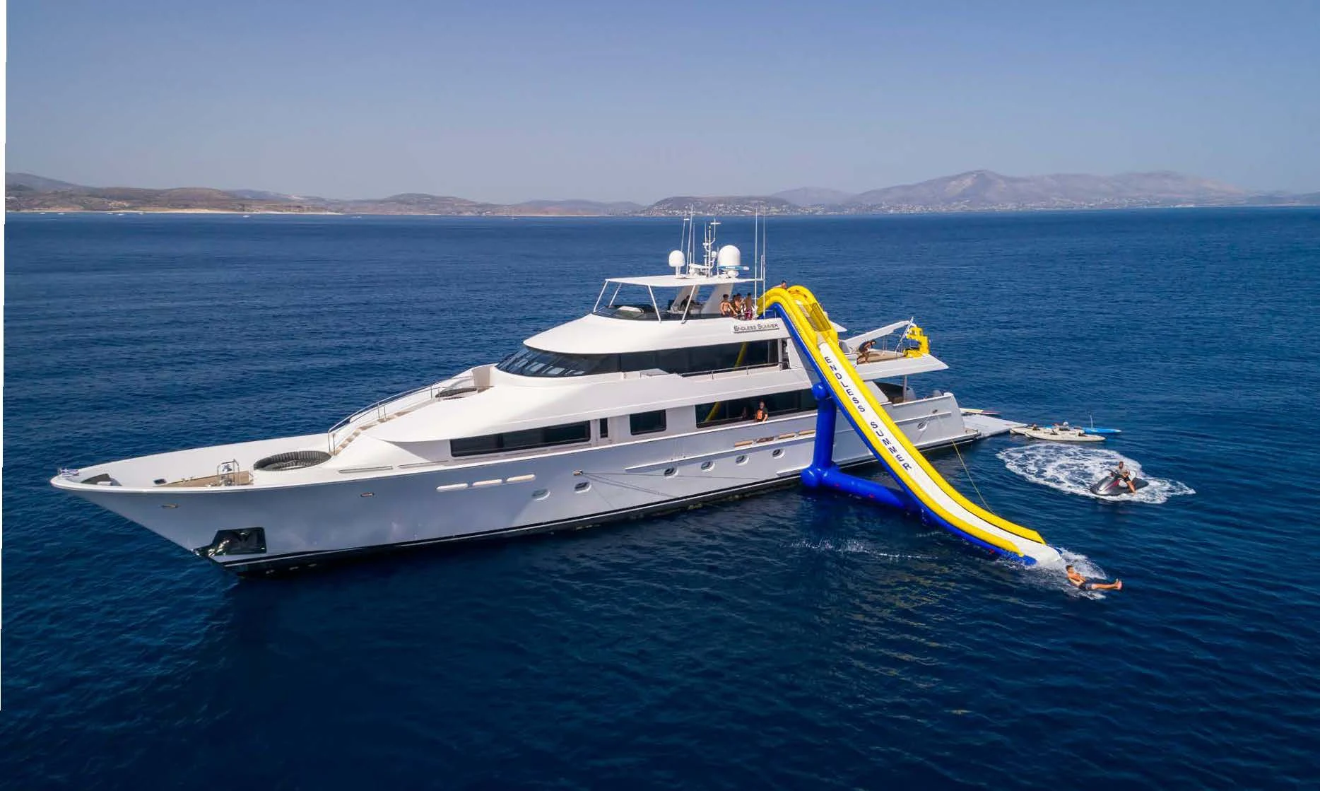 a boat with a yellow buoy aboard ENDLESS SUMMER Yacht for Sale
