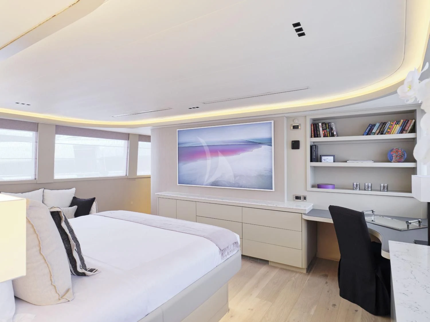 a bedroom with a large tv aboard ENDLESS SUMMER Yacht for Sale