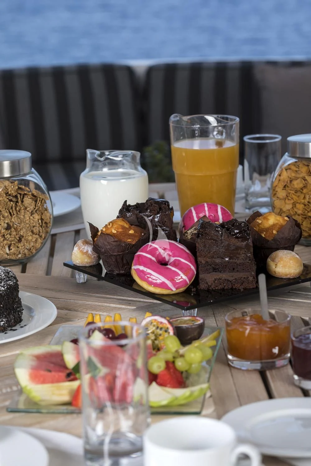 a table with food and drinks on it aboard ENDLESS SUMMER Yacht for Sale