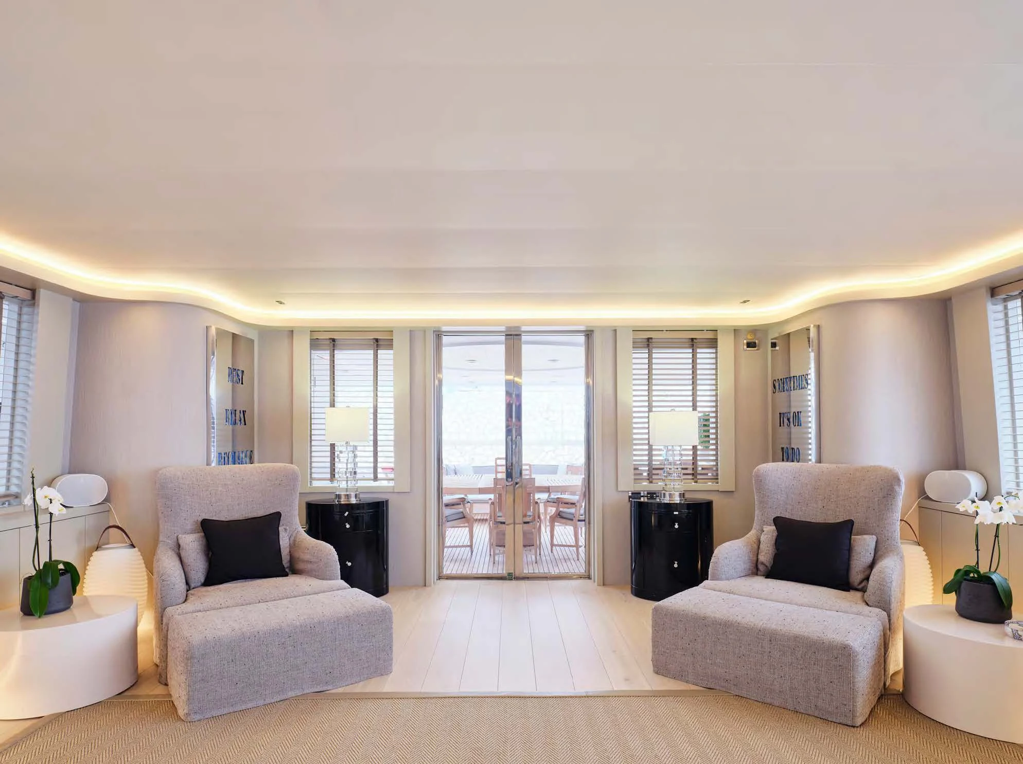 a living room with a large open door aboard ENDLESS SUMMER Yacht for Sale