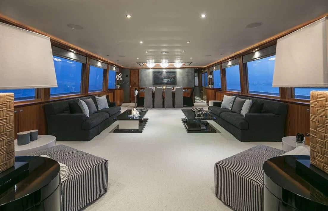 a room with a couch and a table aboard ENDLESS SUMMER Yacht for Sale