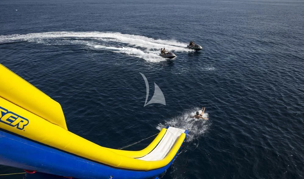 a group of people swimming in the water aboard ENDLESS SUMMER Yacht for Sale