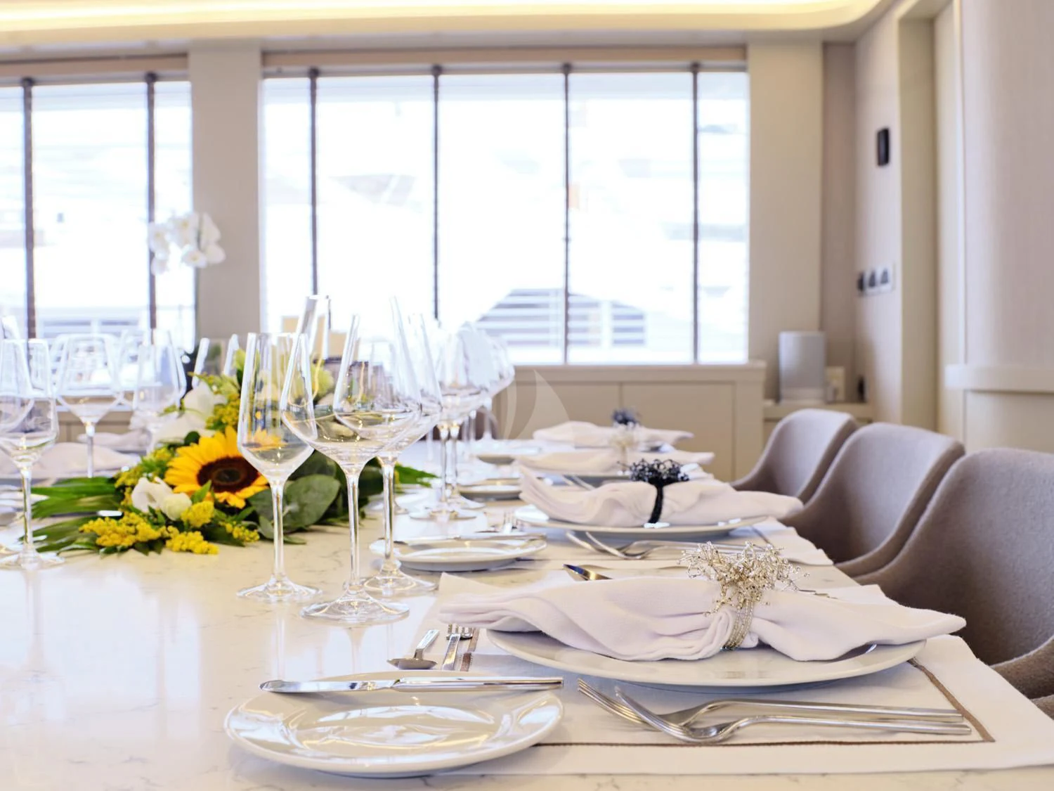 a table set for a dinner aboard ENDLESS SUMMER Yacht for Sale
