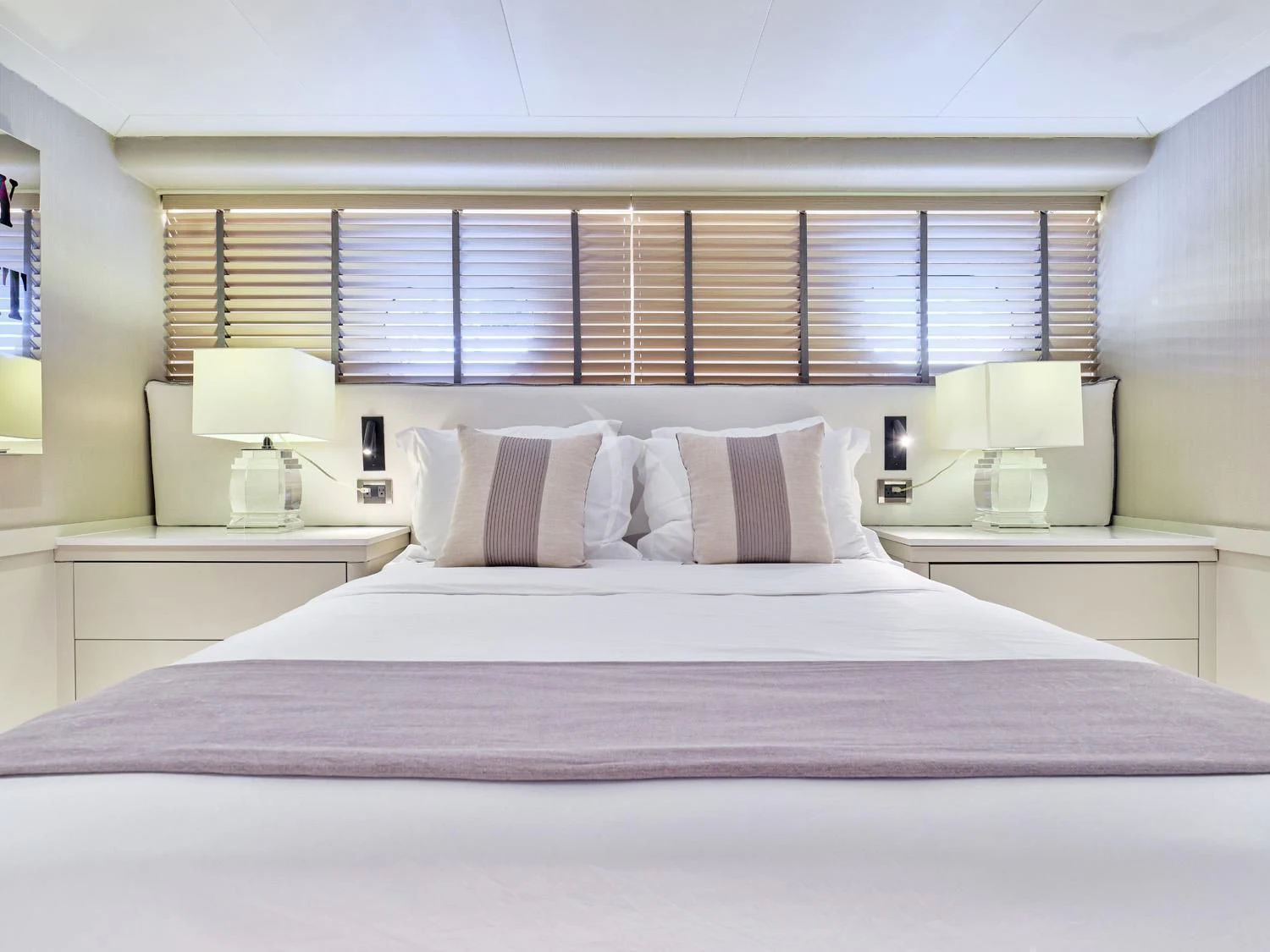 a bed with white sheets aboard ENDLESS SUMMER Yacht for Sale