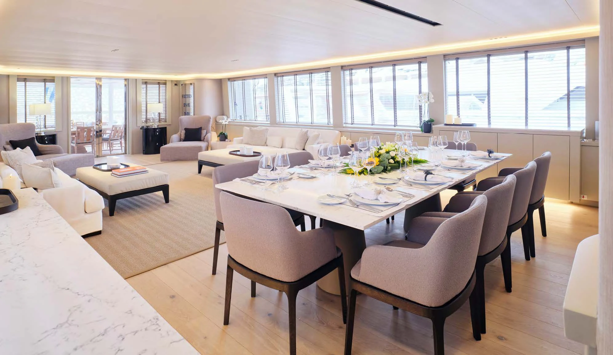 a large room with a table and chairs aboard ENDLESS SUMMER Yacht for Sale