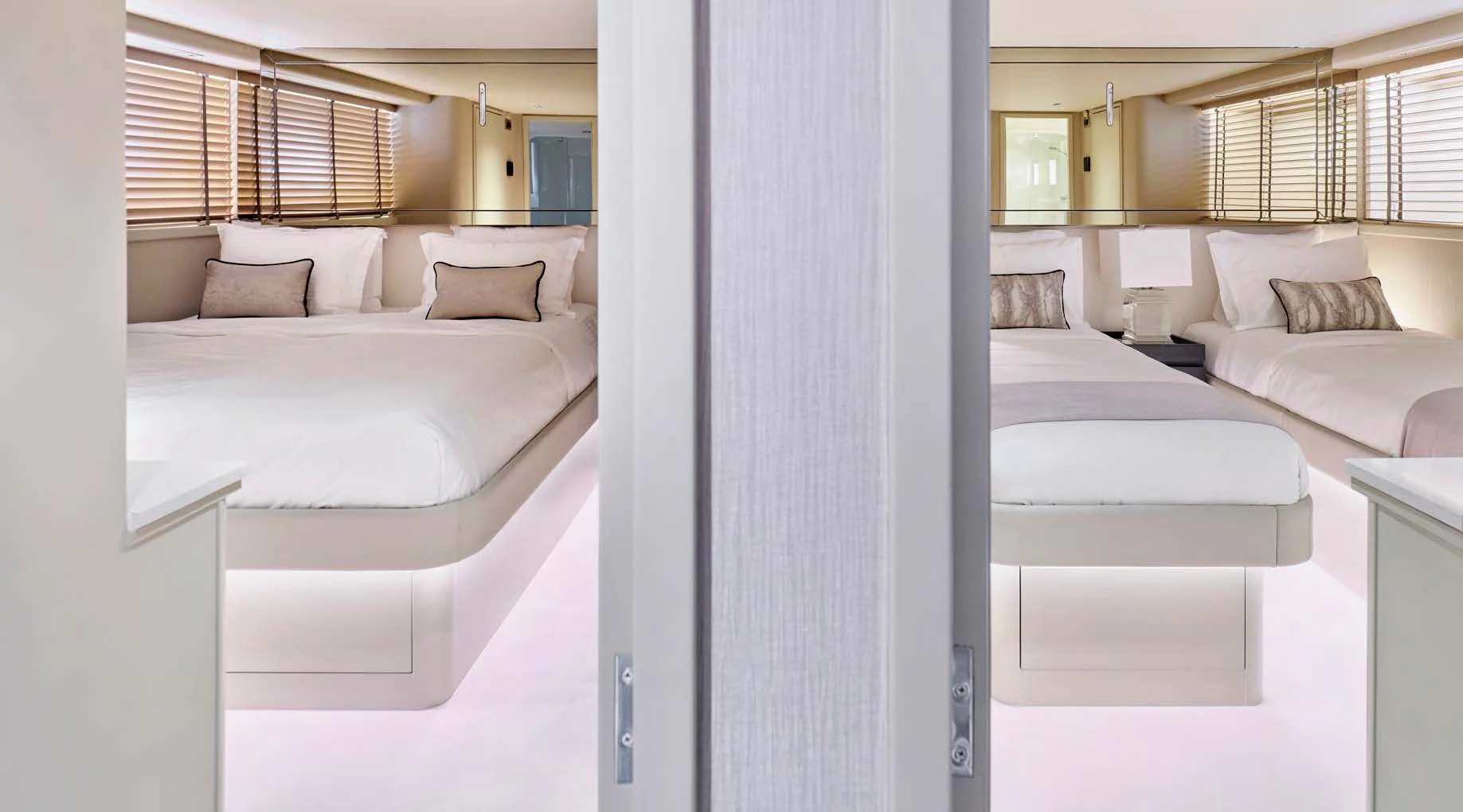 a room with a bed and a mirror aboard ENDLESS SUMMER Yacht for Sale