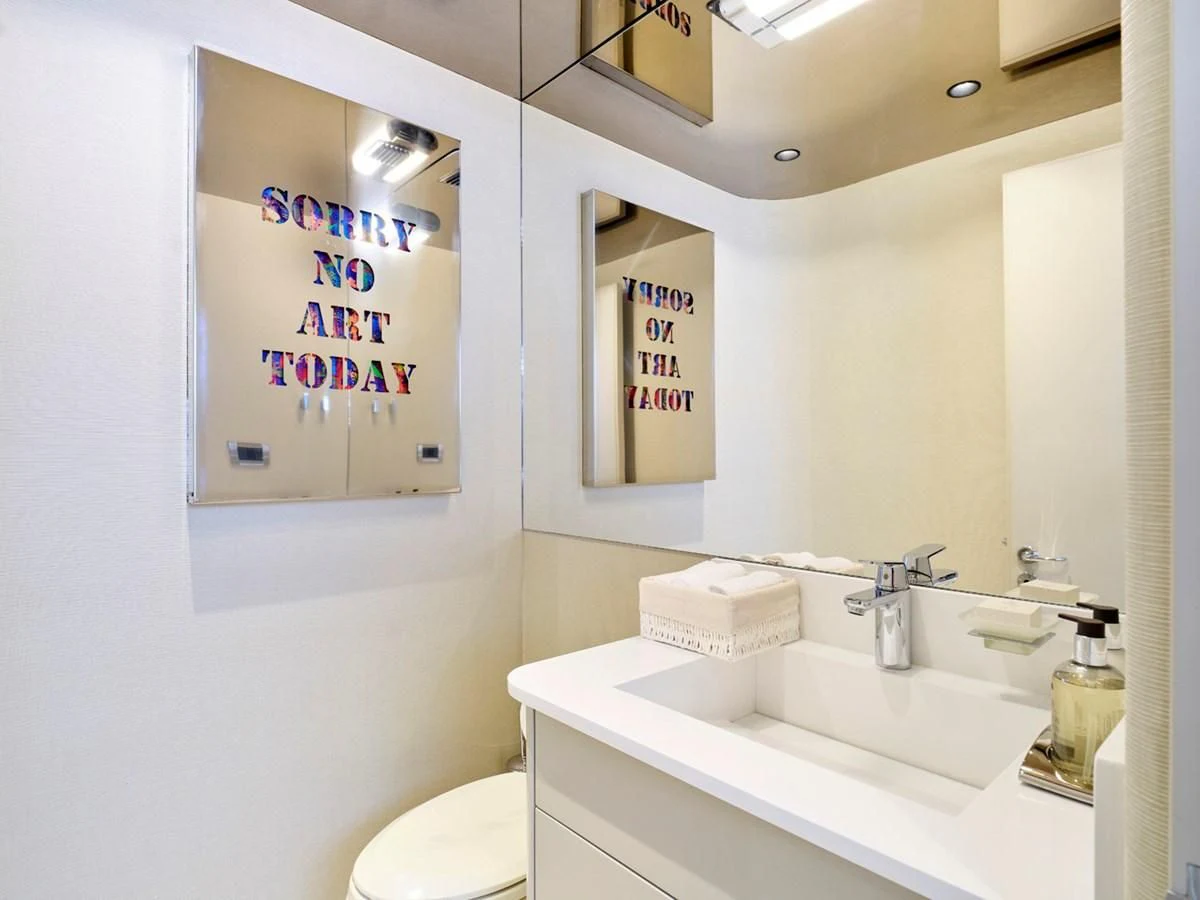 a bathroom with a sink and a toilet aboard ENDLESS SUMMER Yacht for Sale