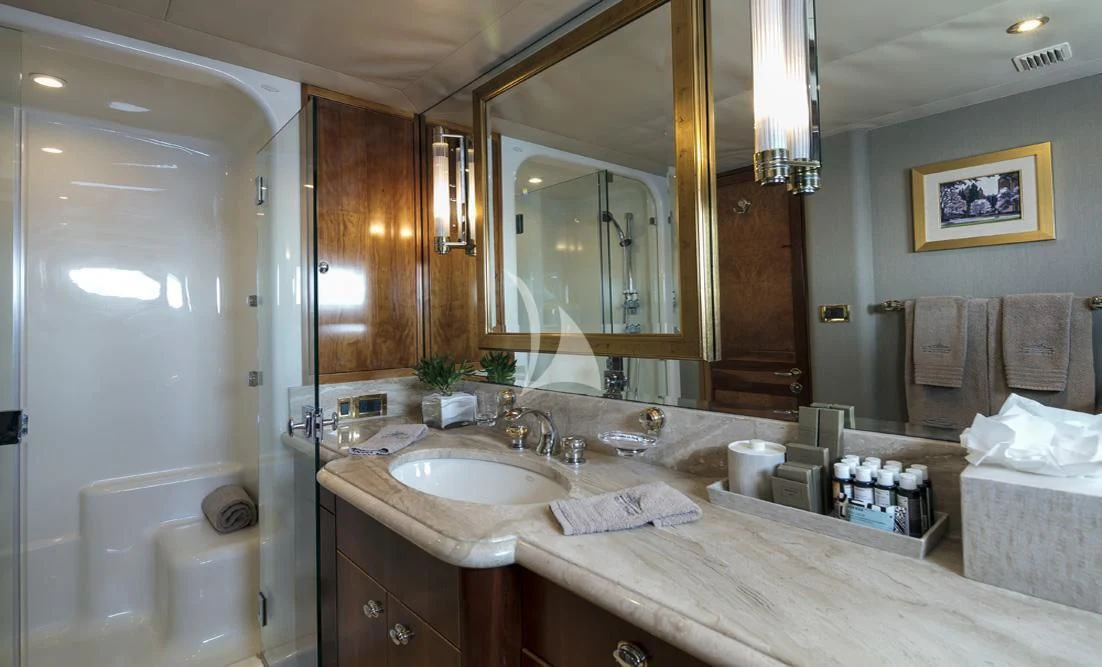 a bathroom with a large mirror aboard ENDLESS SUMMER Yacht for Sale