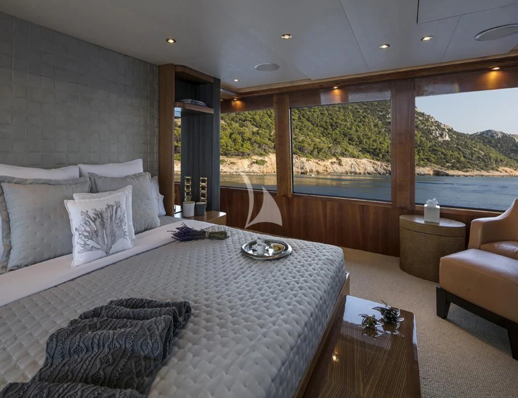 a large bed in a room aboard ENDLESS SUMMER Yacht for Sale