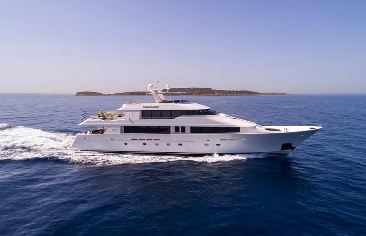 a white yacht on the water aboard ENDLESS SUMMER Yacht for Sale