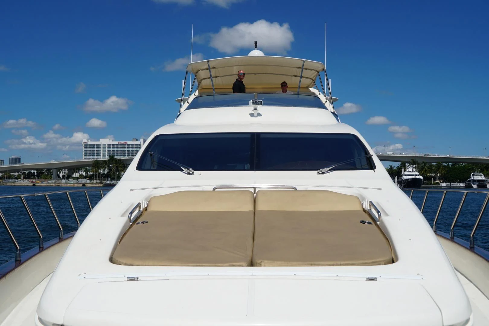 a white yacht on a dock aboard AZURE Yacht for Sale