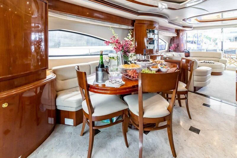 a table with chairs and a table aboard AZURE Yacht for Sale