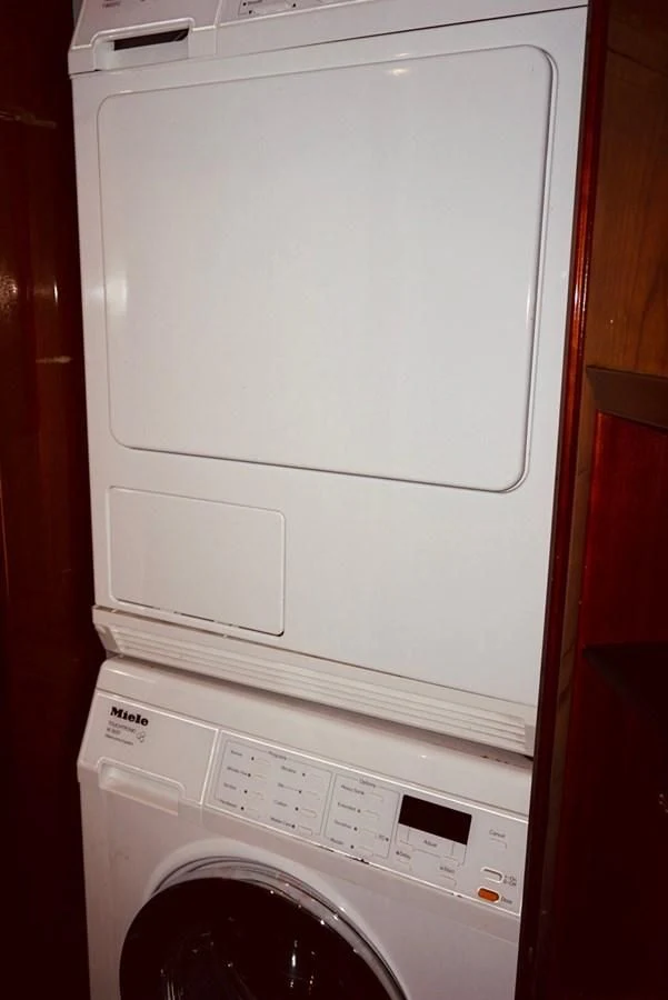 a white washing machine aboard AZURE Yacht for Sale