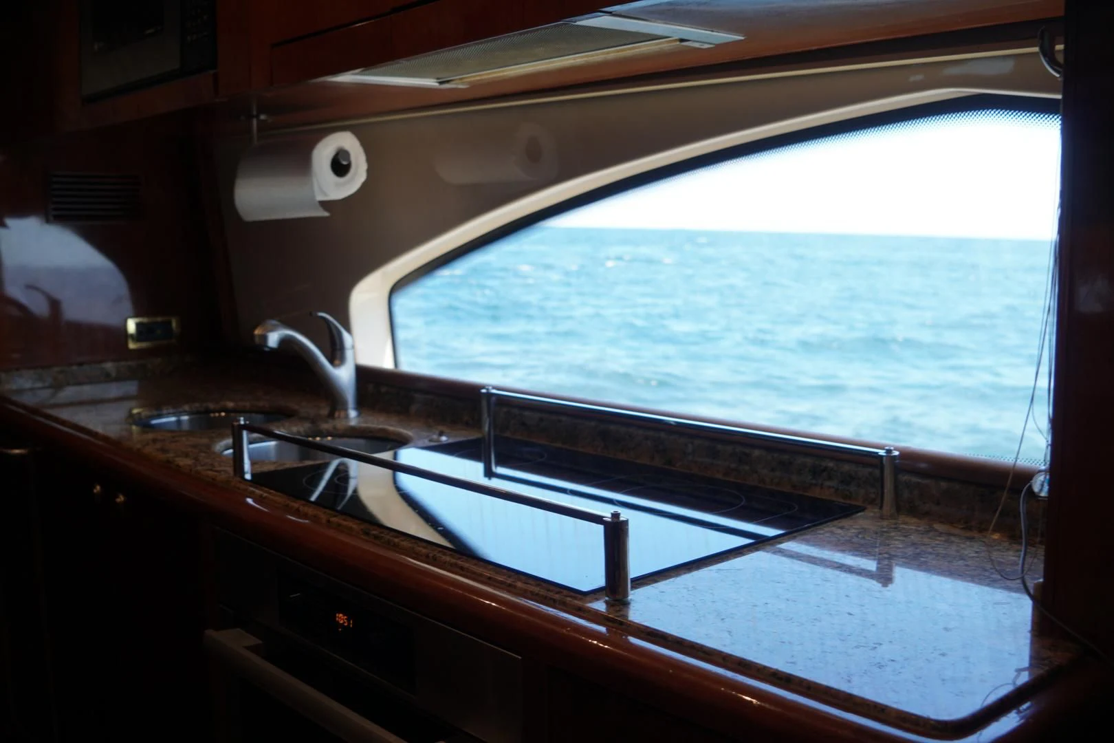 a kitchen with a large window aboard AZURE Yacht for Sale