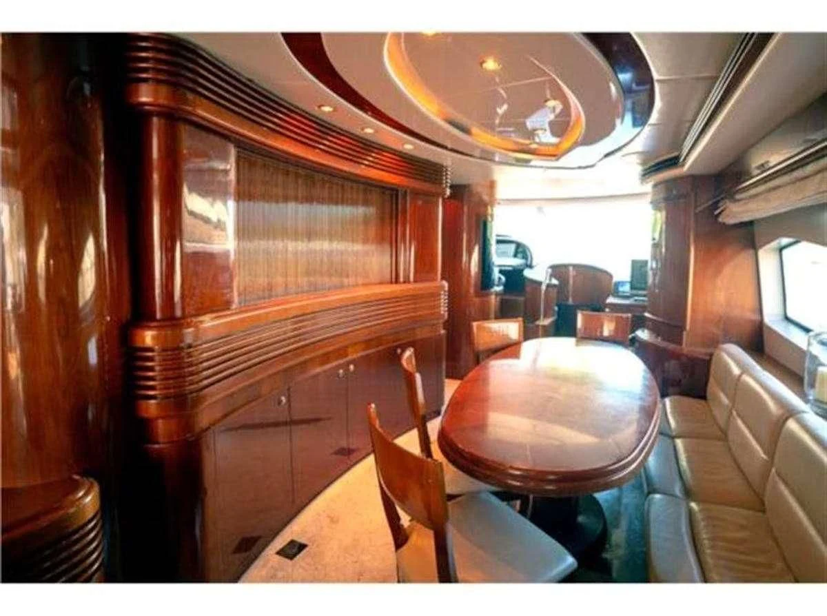 a room with a table and chairs aboard AZURE Yacht for Sale