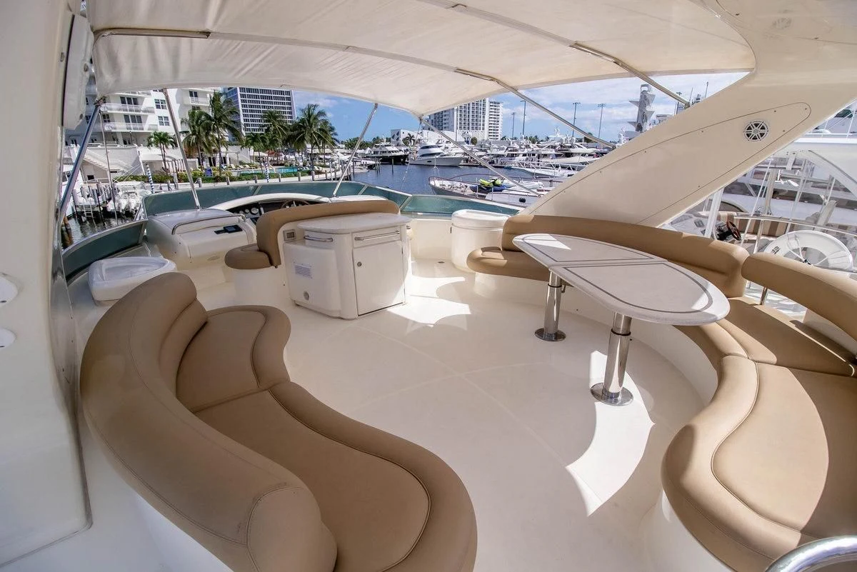 a room with a view of a city and a large pool aboard AZURE Yacht for Sale
