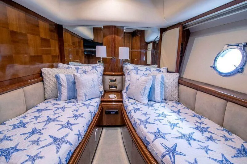 a couple of beds in a room aboard AZURE Yacht for Sale