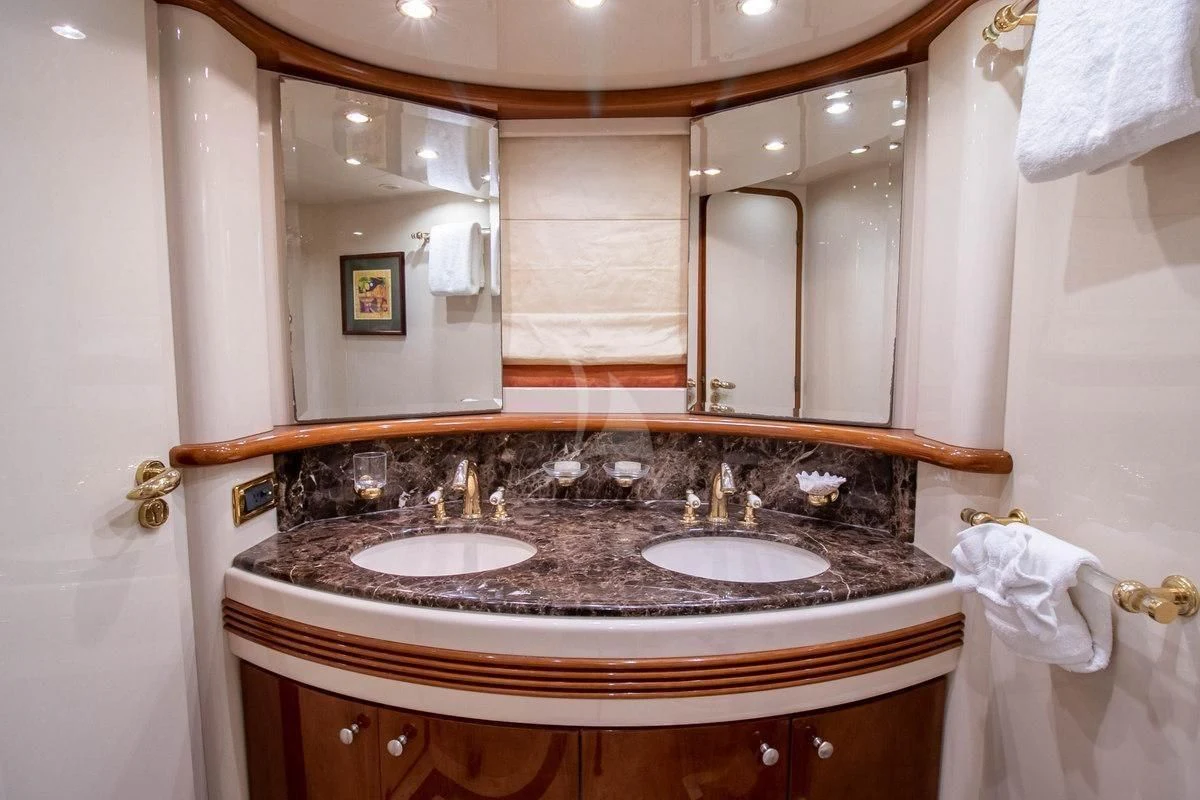 a bathroom with two sinks aboard AZURE Yacht for Sale