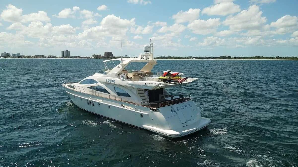 a white boat in the water aboard AZURE Yacht for Sale