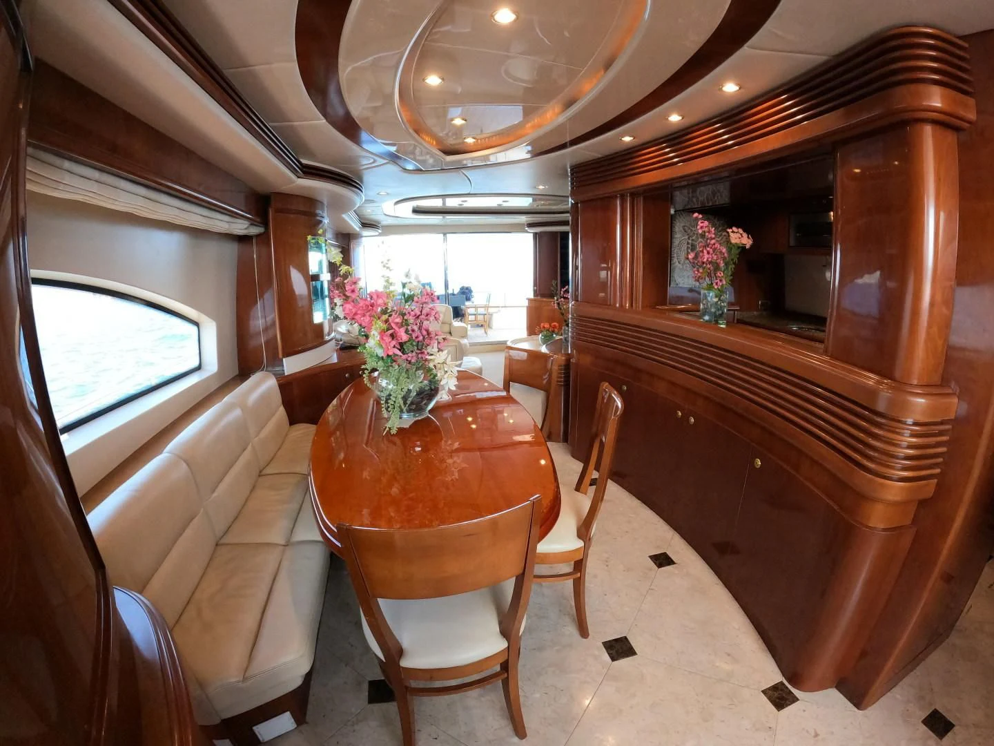 a room with a table and chairs aboard AZURE Yacht for Sale