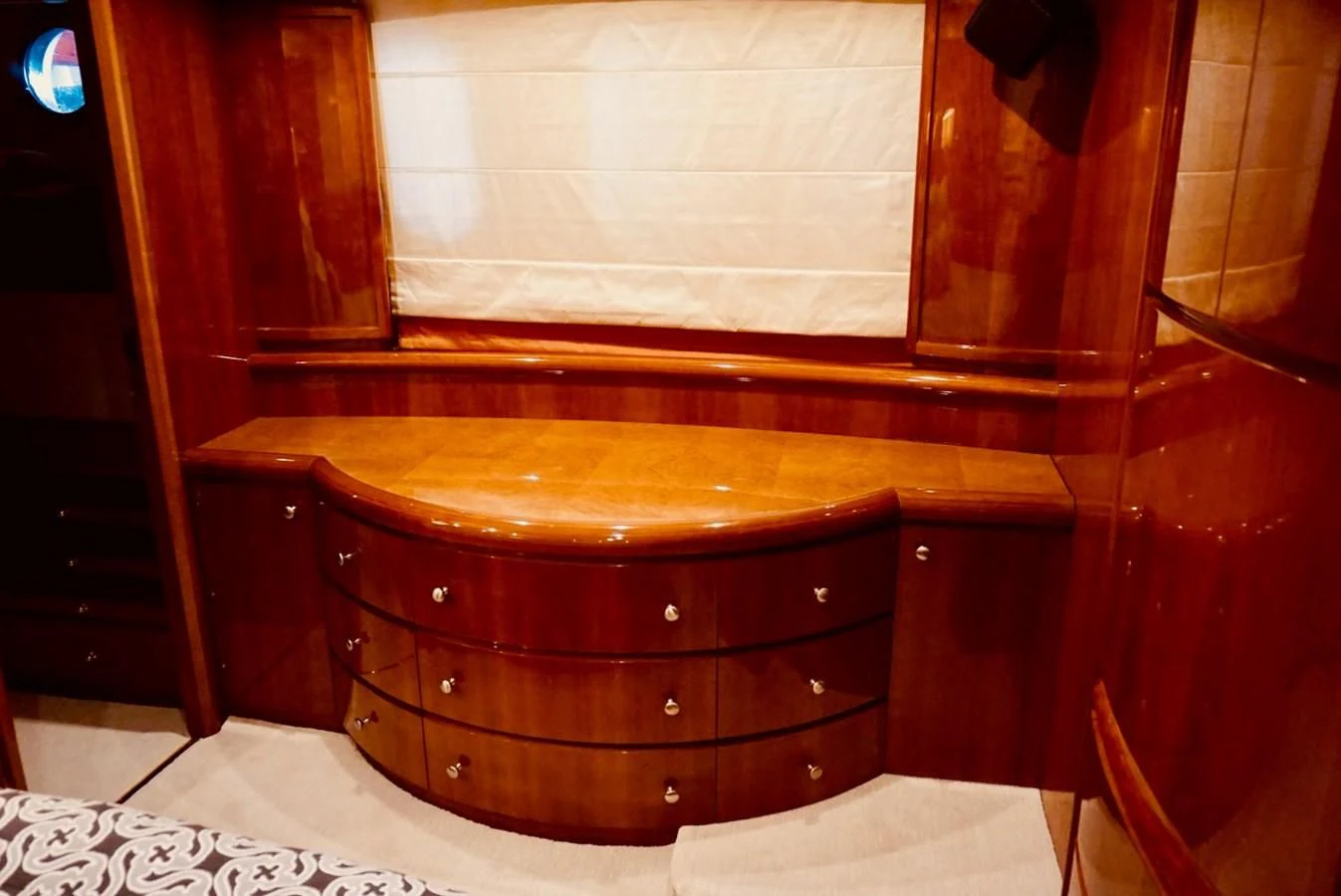 a dresser in a room aboard AZURE Yacht for Sale