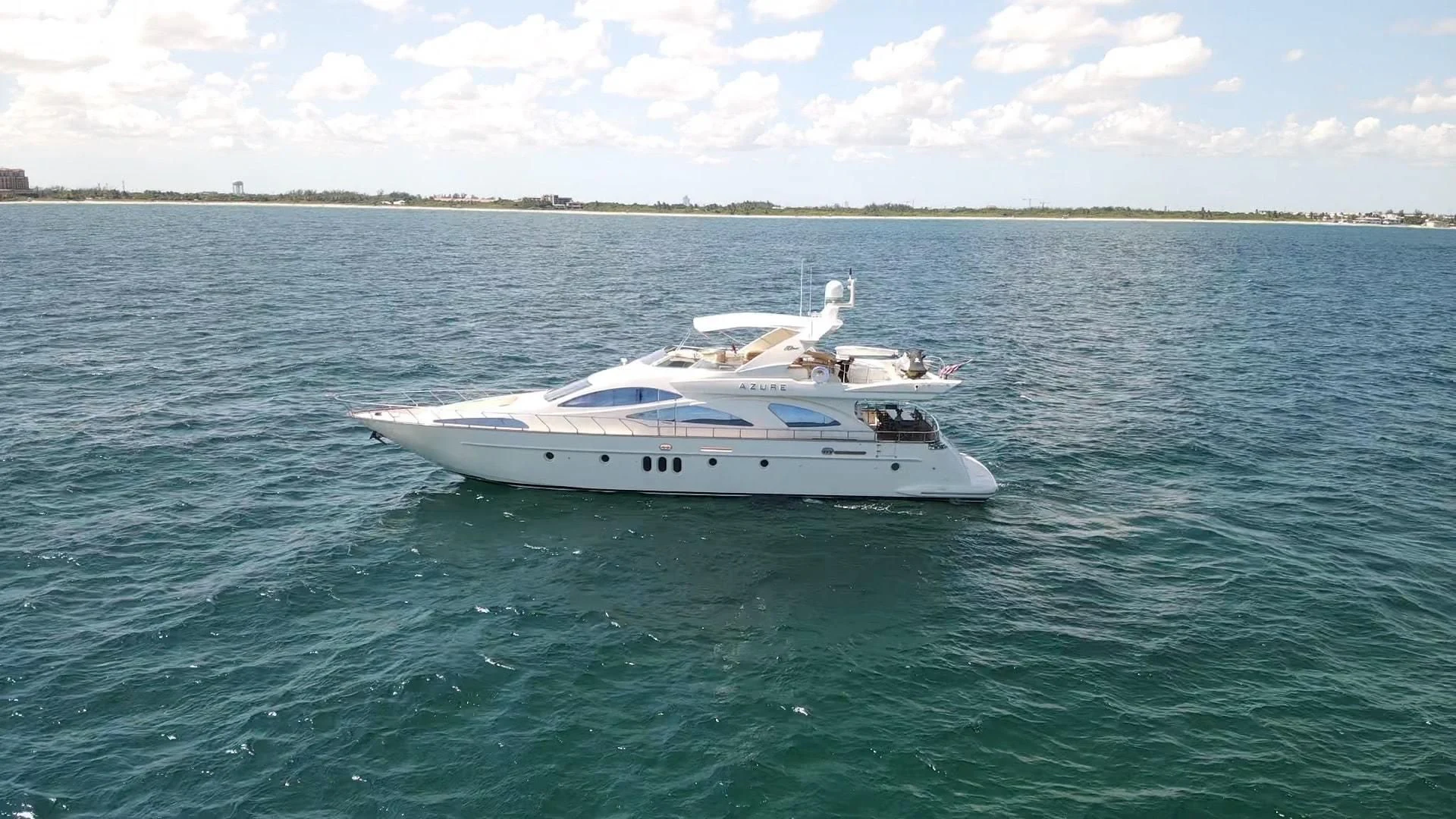 a white boat in the water aboard AZURE Yacht for Sale