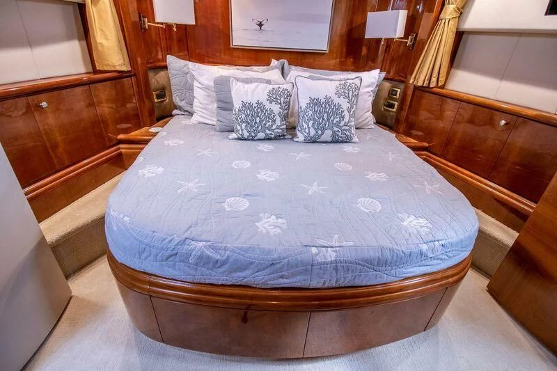 a bed with white sheets aboard AZURE Yacht for Sale
