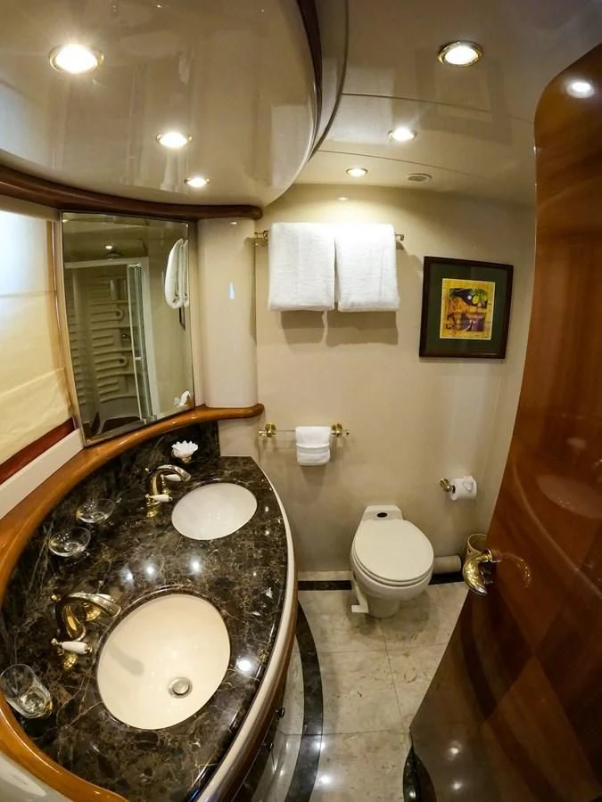 a bathroom with a marble countertop aboard AZURE Yacht for Sale