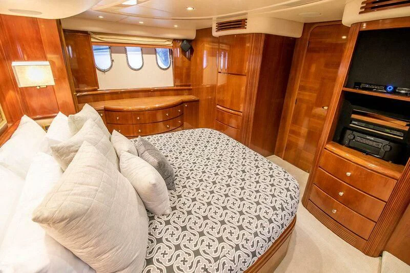 a bed with white sheets aboard AZURE Yacht for Sale