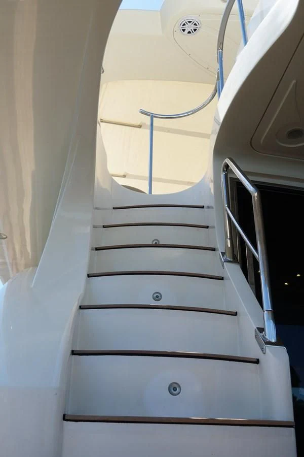 a white staircase with a railing aboard AZURE Yacht for Sale
