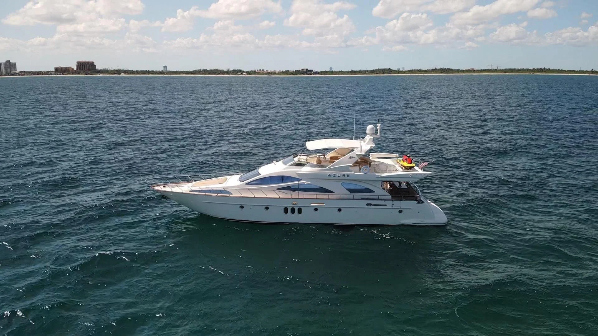 a white boat in the water aboard AZURE Yacht for Sale
