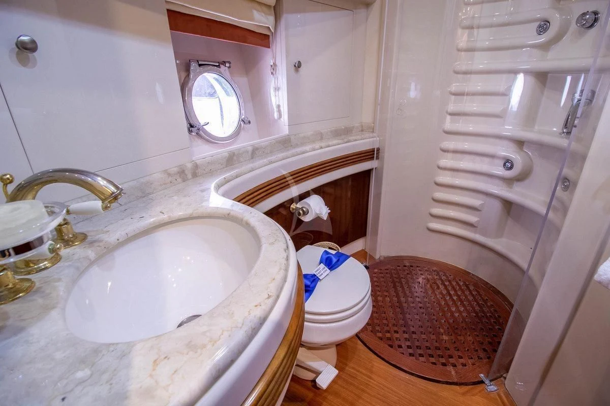 a bathroom with a sink and toilet aboard AZURE Yacht for Sale