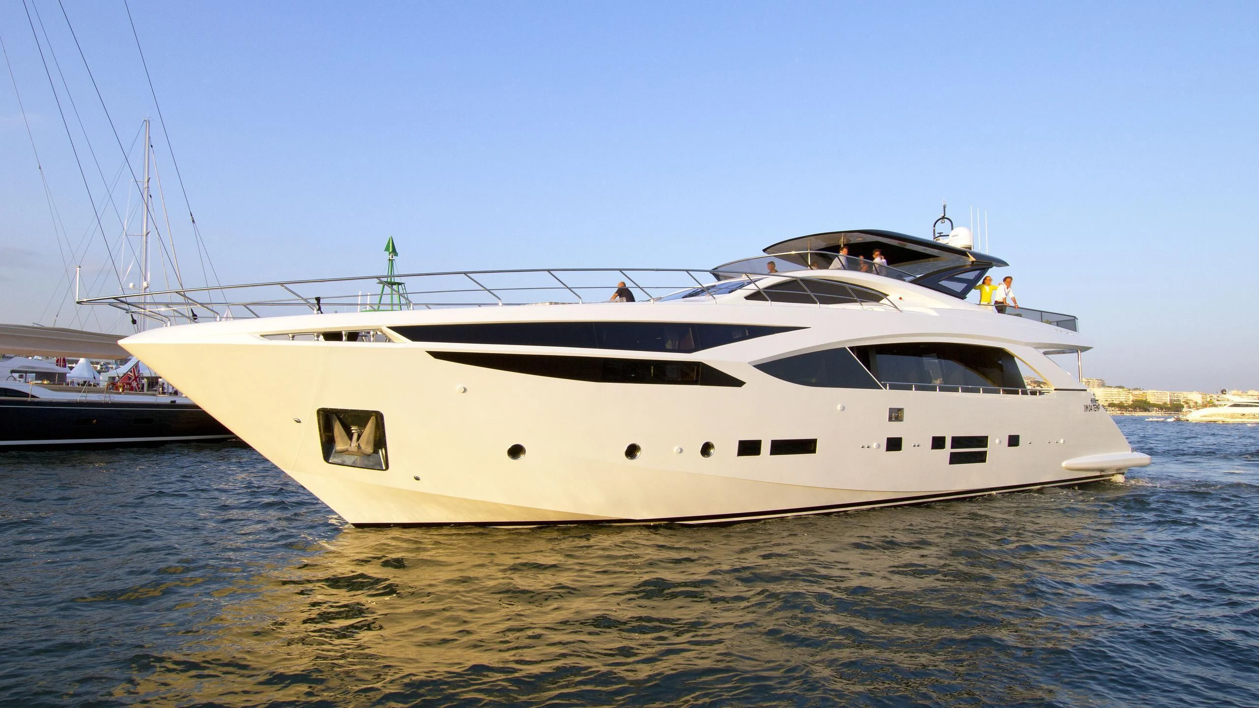 a white yacht on the water aboard SEATALY Yacht for Sale