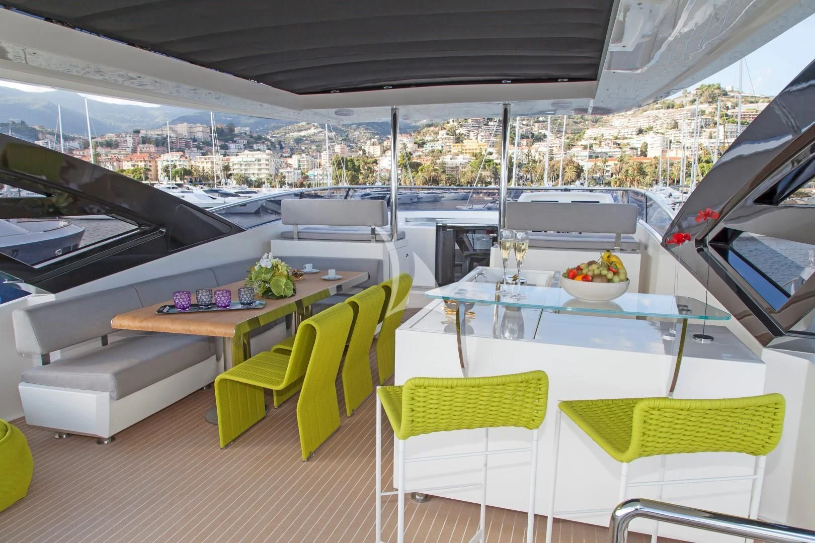 a room with tables and chairs aboard SEATALY Yacht for Sale