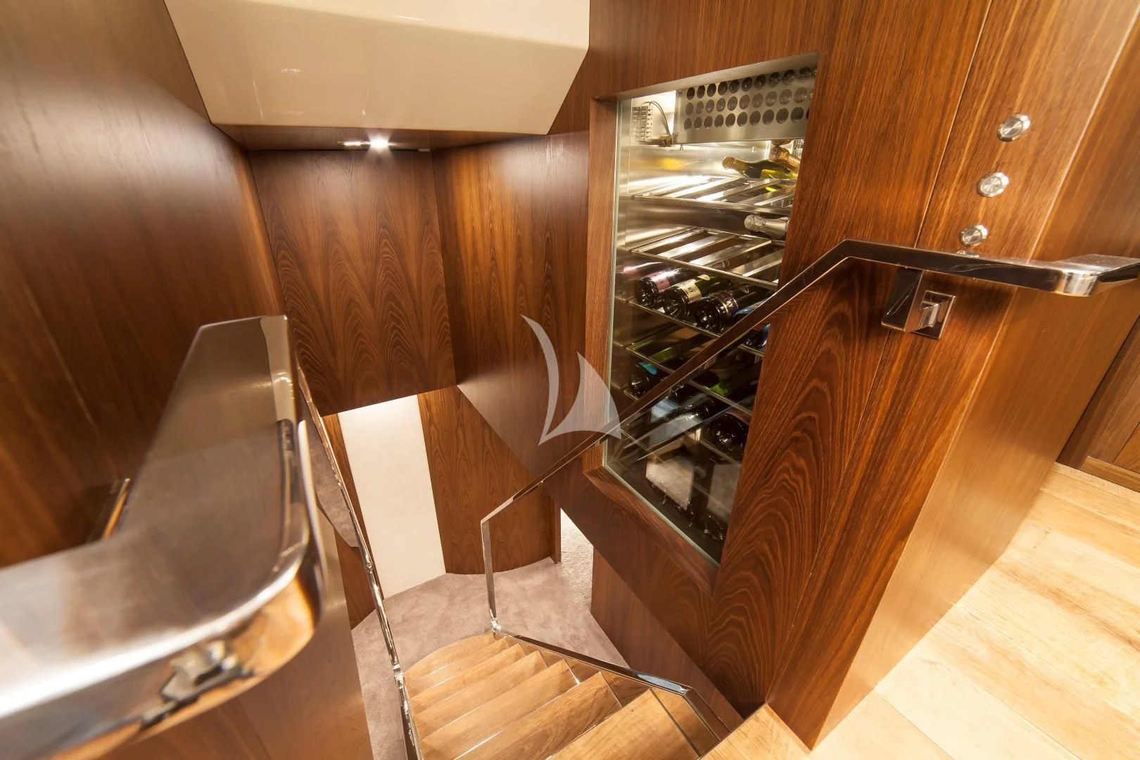 a kitchen with a stove and a ladder aboard SEATALY Yacht for Sale