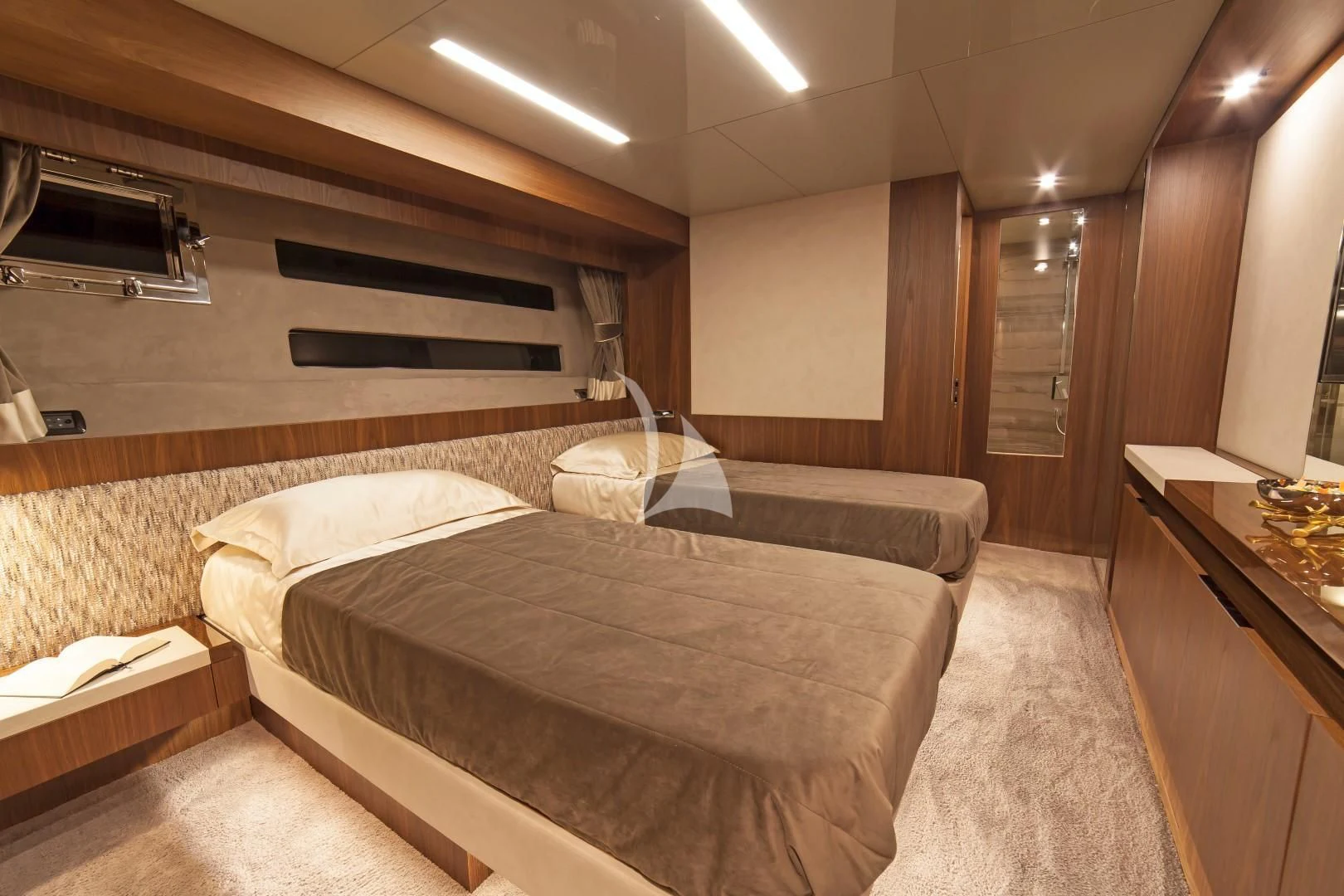 a room with a bed and a desk aboard SEATALY Yacht for Sale
