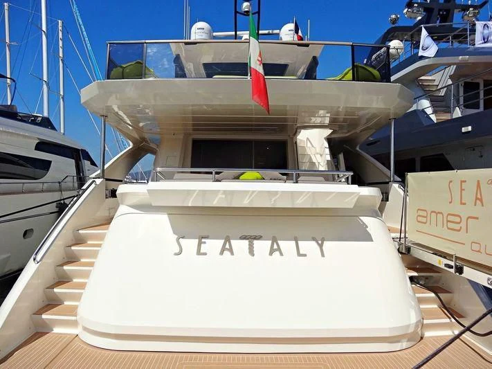 a white box with a red ribbon on it aboard SEATALY Yacht for Sale