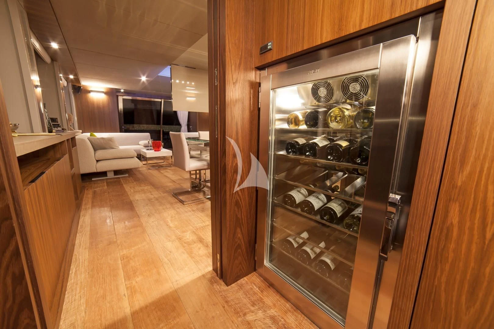 a room with a wood cabinet aboard SEATALY Yacht for Sale