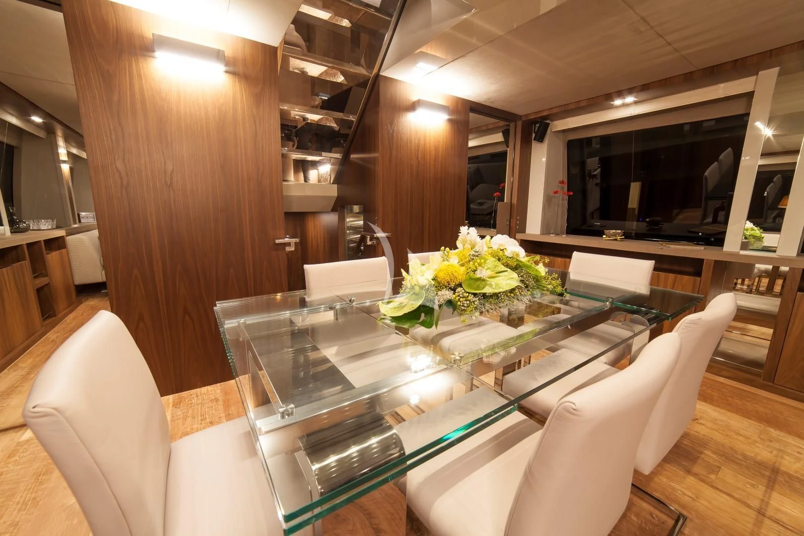 a room with a table chairs and a television aboard SEATALY Yacht for Sale