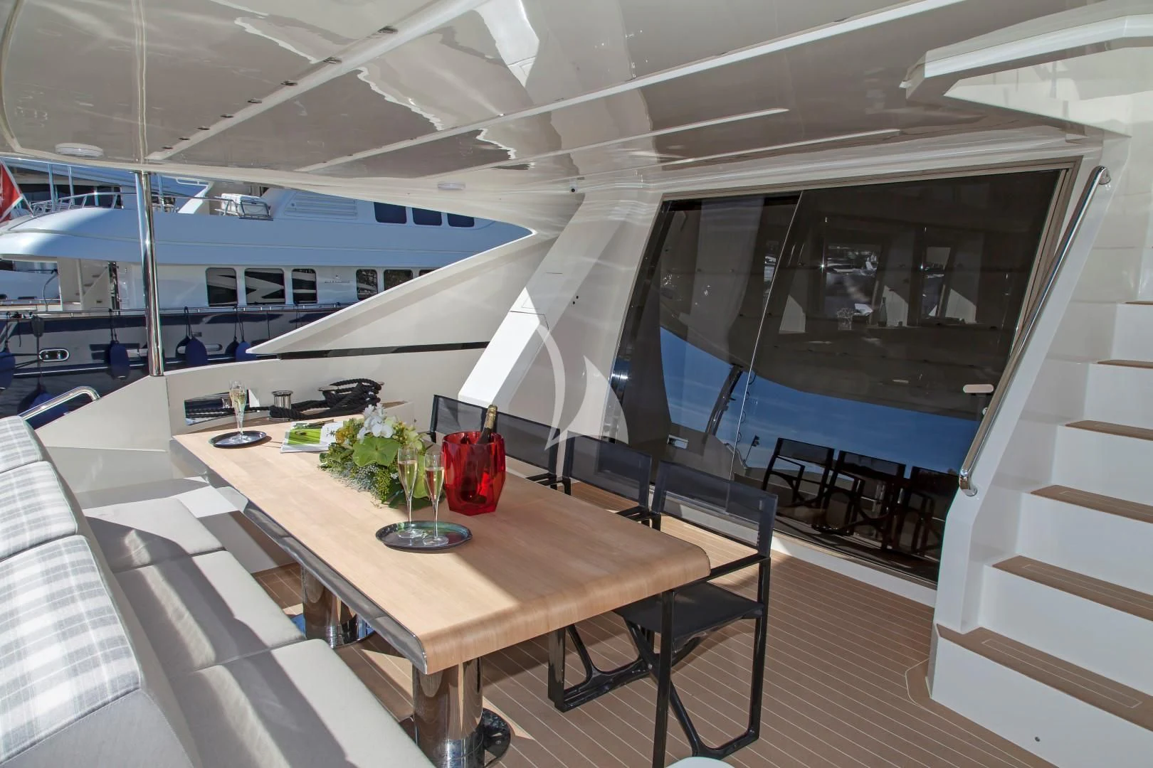 a table with a plant on it aboard SEATALY Yacht for Sale