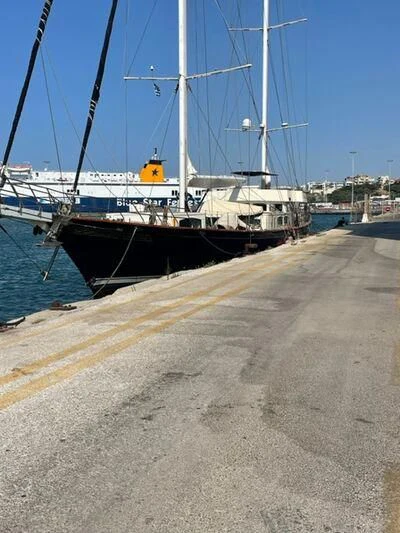 a boat docked at a pier aboard PHELAN GOOD Yacht for Sale