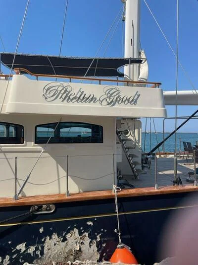 a boat docked at a pier aboard PHELAN GOOD Yacht for Sale